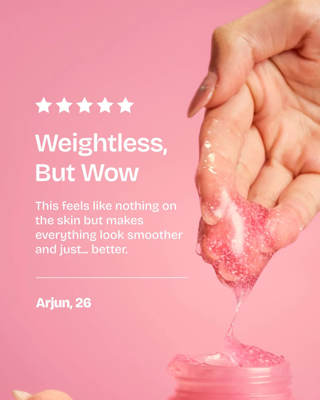 Hand applying a pink skincare product with text on a pink background